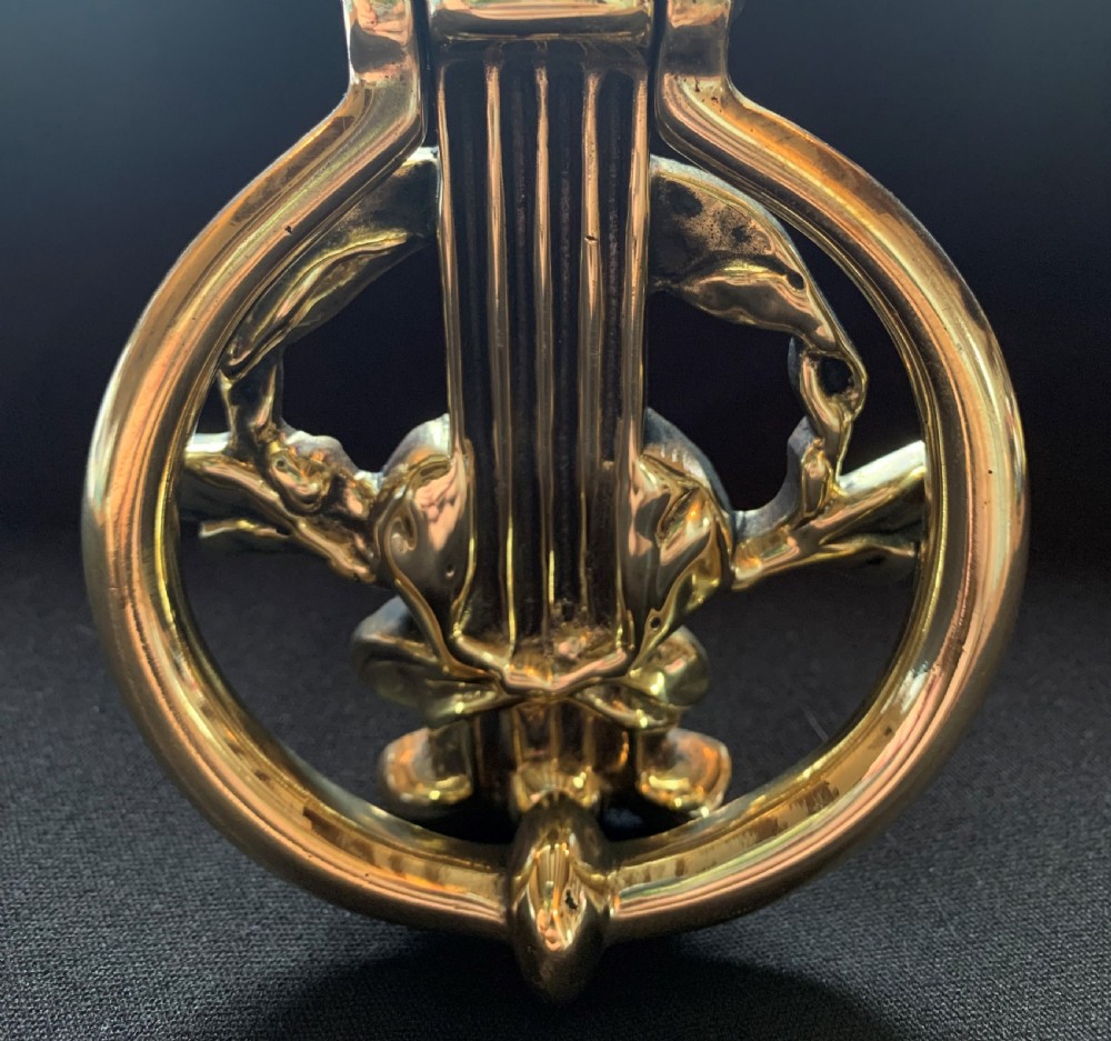 One Brass French Cherub's Face Door Knocker. View III