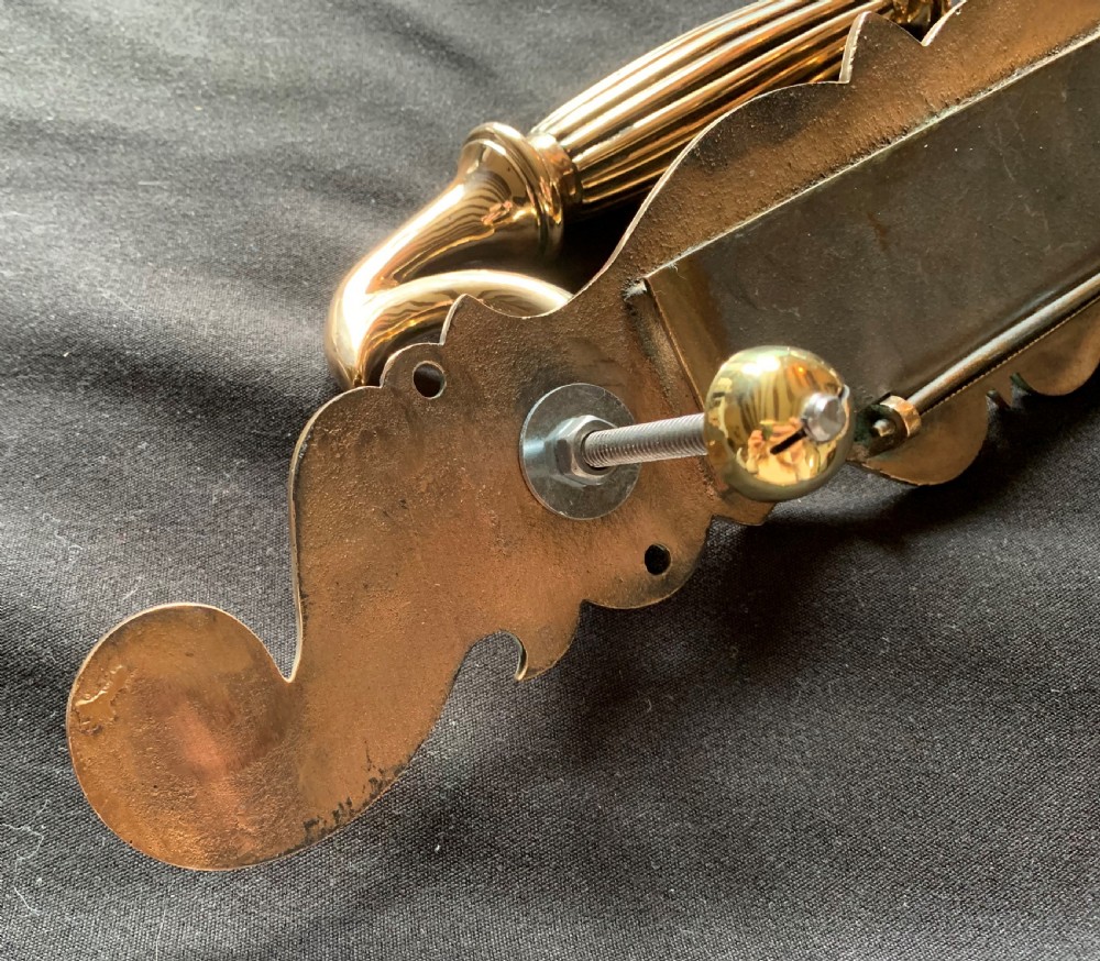 A polished Victorian bronze letter plate featuring an integrated scroll door pull handle and engraved scrollwork details. View VI