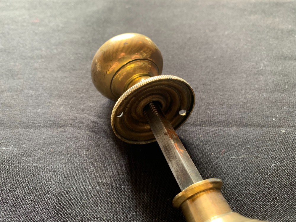 One Pair of Brass Georgian Rim Lock Door Knobs. View VI