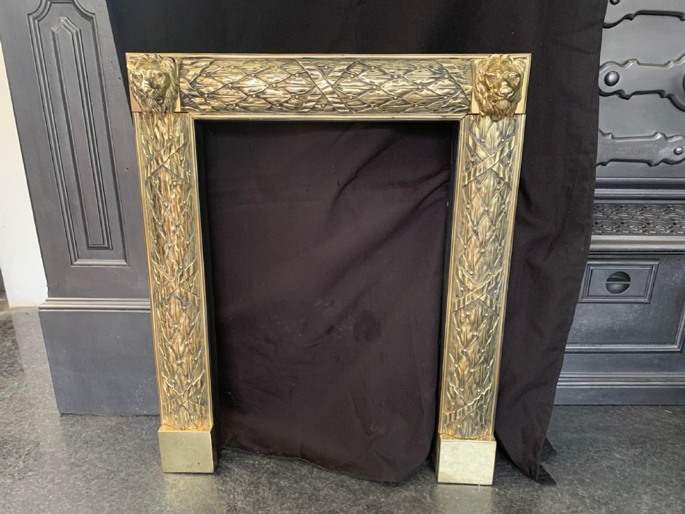 One Brass Victorian Lion Head Fire Surround.