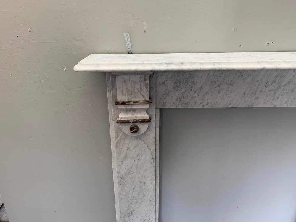 1920's Embellished Brown Marble Fireplace Surround. View II