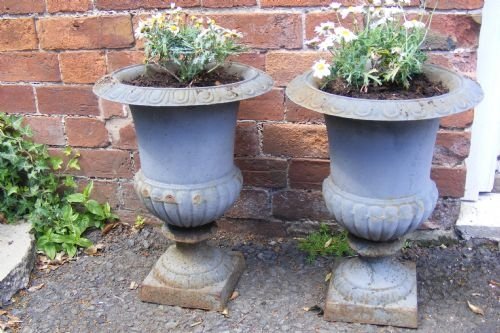 Pair of Decorative Cast Iron Urns.