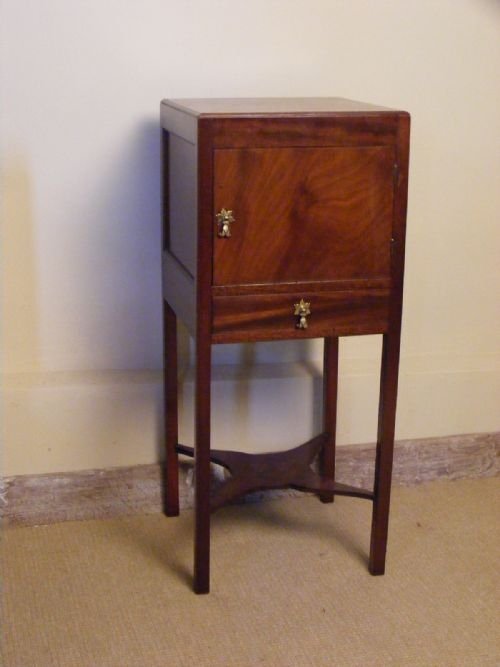 fig 1.  George III mahogany bedside cupboard. with small drawer below cupboard with brass drop handles.