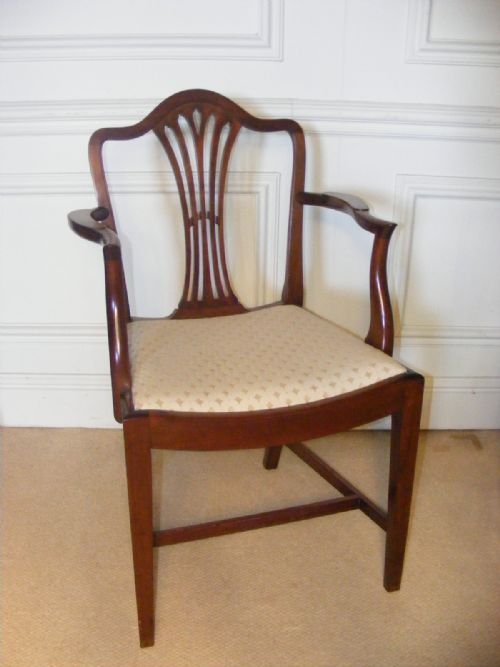 fig 1. Set of 12 Hepplewhite style mahogany dining chairs.