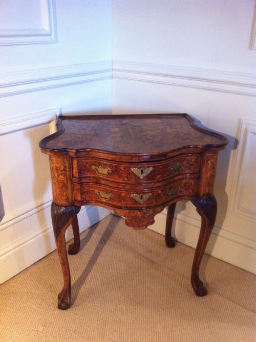 fig 1. Unusual Dutch walnut Serpentine marquetry table