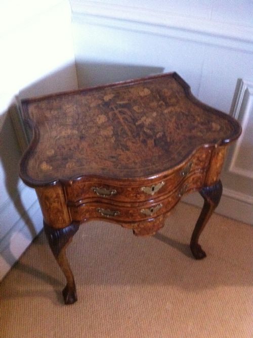 fig 2. Unusual Dutch walnut Serpentine marquetry table