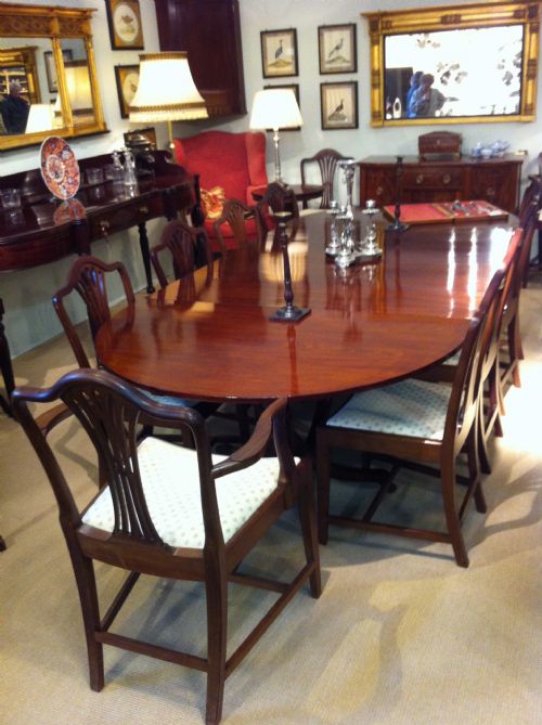 Set of 12 Hepplewhite Style Mahogany Dining Chairs.