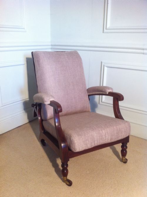 fig 1. Unusual mahogany reclining campaign chair newly upholstered by J Shoolbred.
