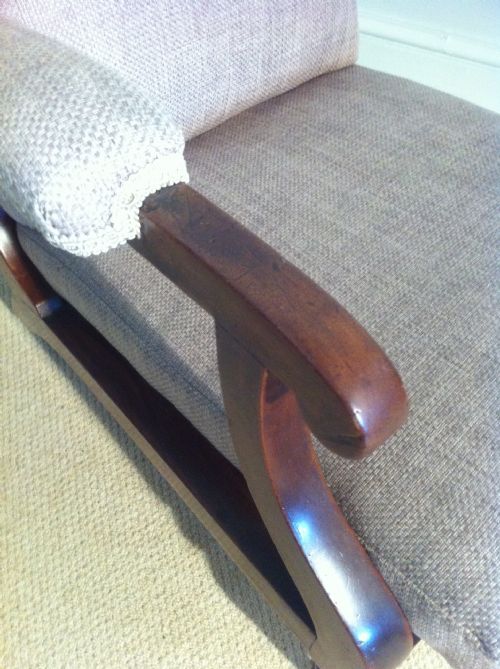 fig 3. Unusual mahogany reclining campaign chair newly upholstered by J Shoolbred.