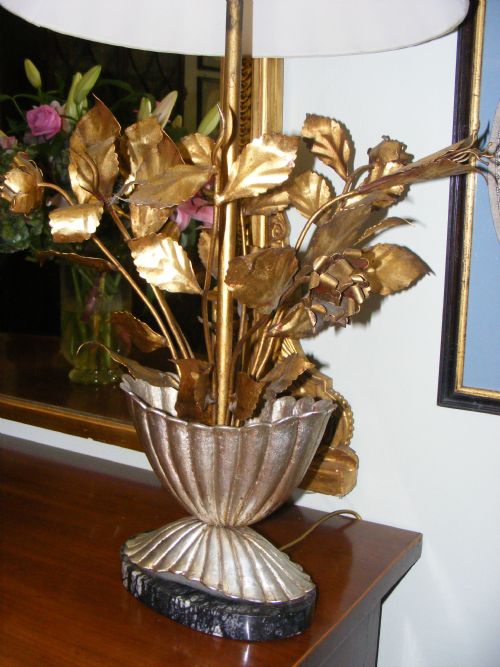 fig 1. Unusual pair of gilded metal lamps.