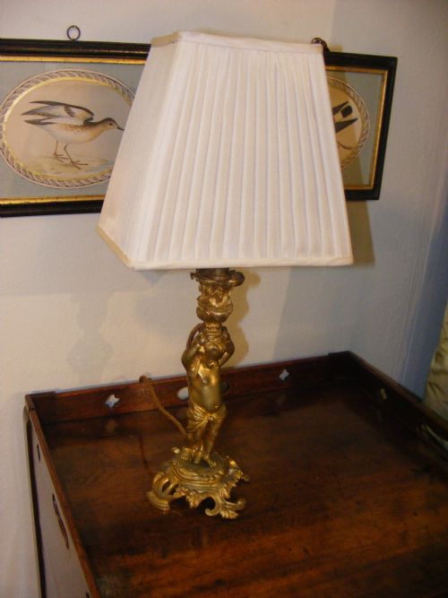 Pair of 19th Century Cherub Lamps.