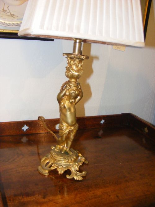 fig 2. Pair of 19th century cherub lamps.