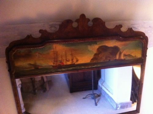 fig 2. Unusual walnut mirror with a painted naval sea view.