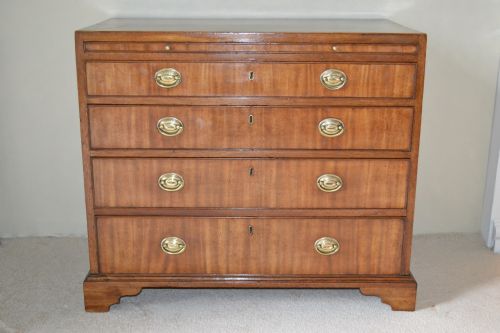 A Very Good Small Sheraton Mahogany Chest of Drawers with Brushing Slide.