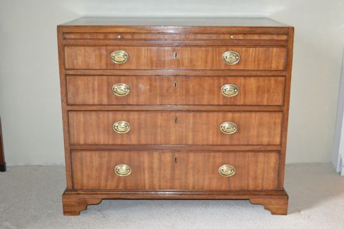 fig 2. A very good small Sheraton mahogany chest of drawers with brushing slide.