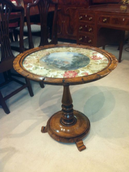 fig 1. Rare rosewood occasional table with a tapestry and circular watercolour under the glass top