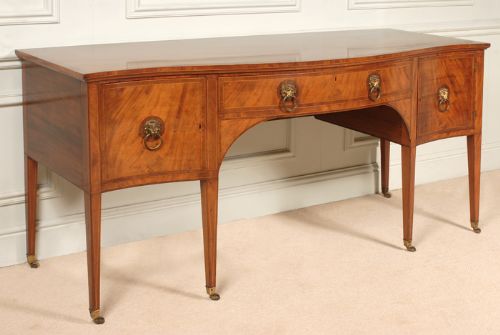 fig 1. George III Sheraton mahogany serpentine sideboard