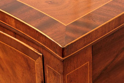 fig 2. George III Sheraton mahogany serpentine sideboard