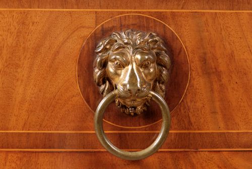 fig 3. George III Sheraton mahogany serpentine sideboard