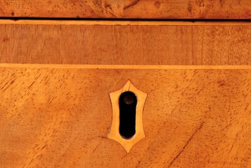 fig 4. George III Sheraton mahogany serpentine sideboard