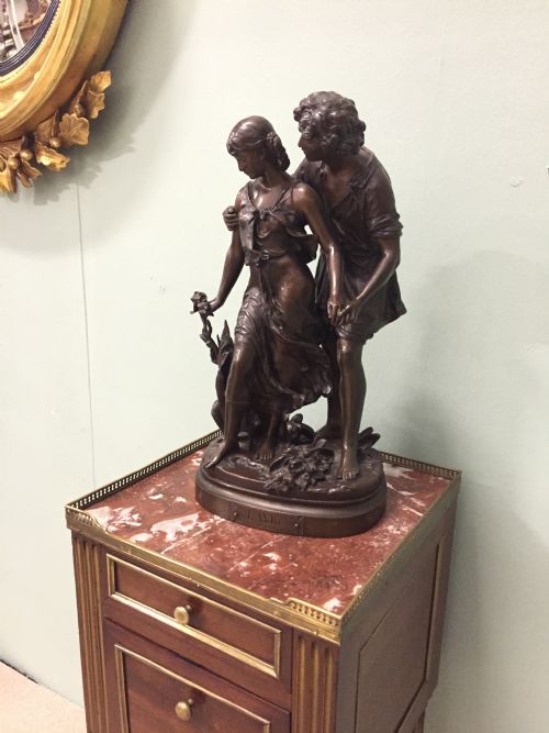 fig 1. 19th Century large French bronze sculpture of a young man and woman