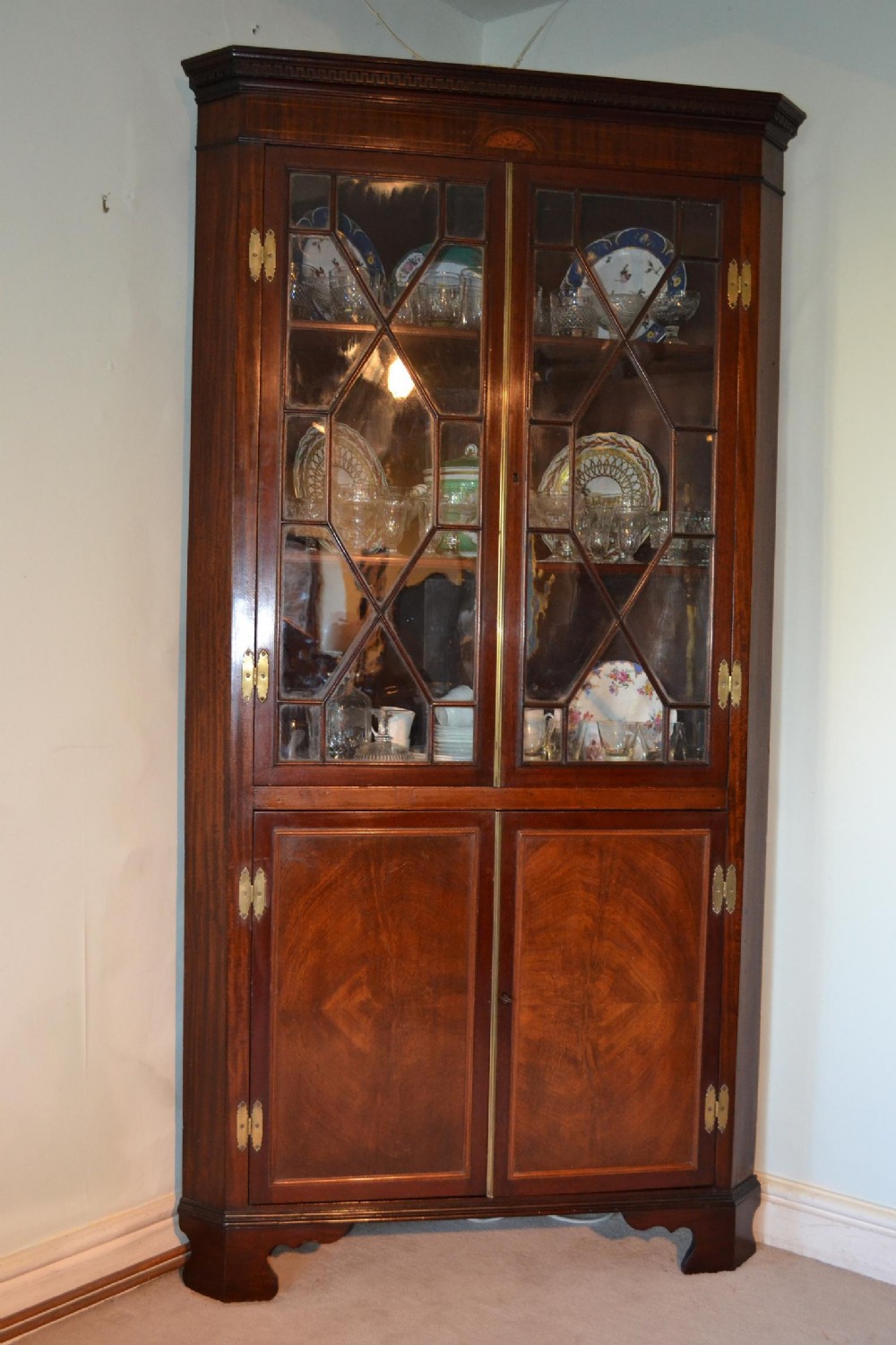 Sheraton mahogany double corner cupboard