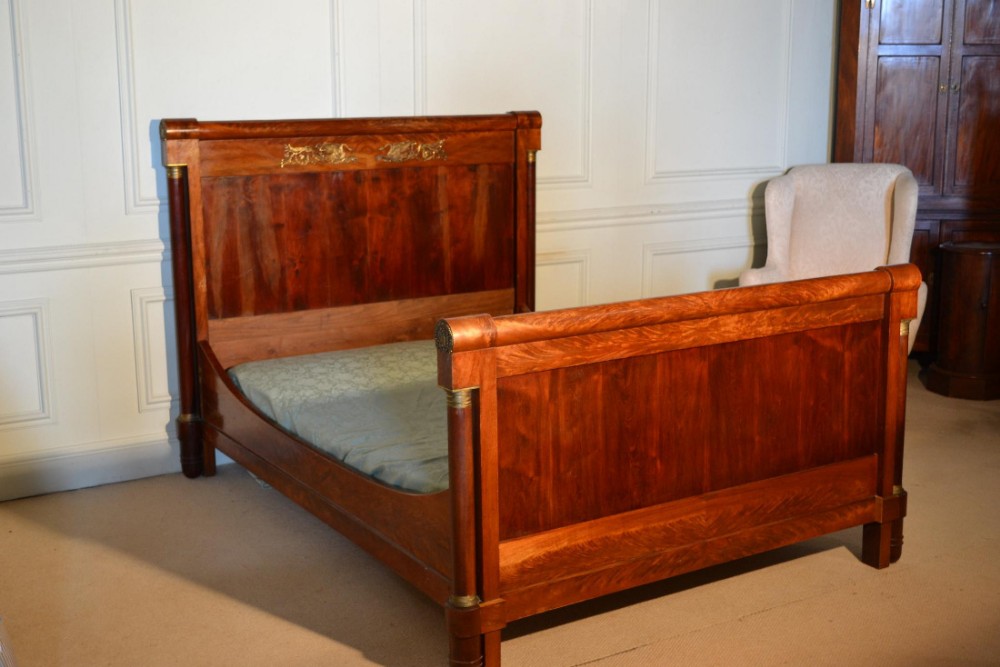 Good French Empire 5ft wide walnut bed with gilt bronze decoration