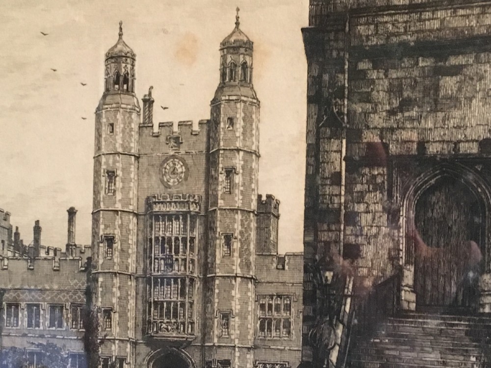 A framed Victorian monochrome etching depicting Luptons Tower at Eton College, set within a cream mount and a black and gold frame. View V