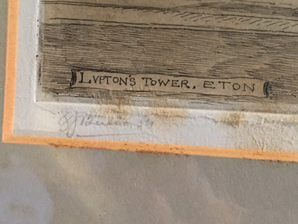 A framed Victorian monochrome etching depicting Luptons Tower at Eton College, set within a cream mount and a black and gold frame. View VII