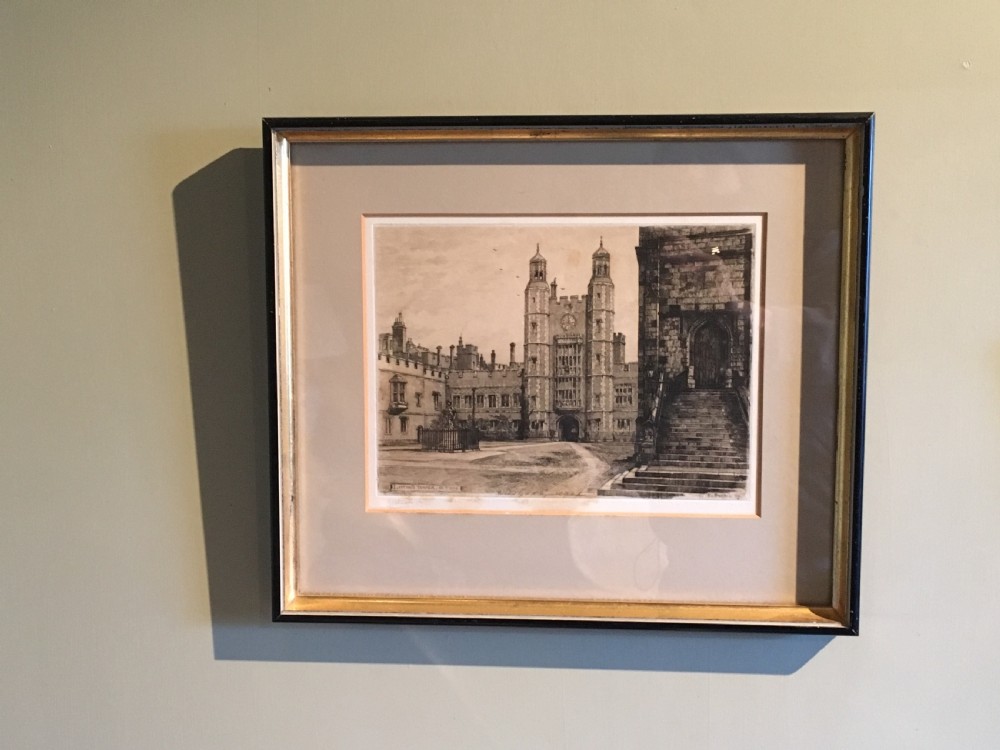 A framed Victorian monochrome etching depicting Luptons Tower at Eton College, set within a cream mount and a black and gold frame. View X