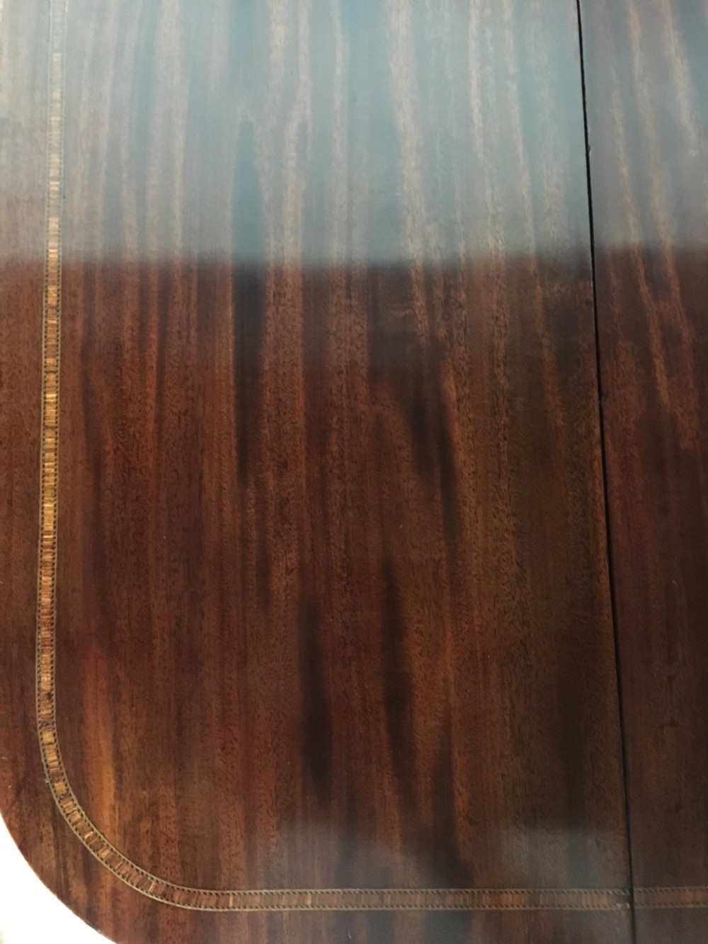A Georgian mahogany sofa table with two drop leaves, front drawers with brass knobs, and splayed legs ending in brass claw castors. View VII