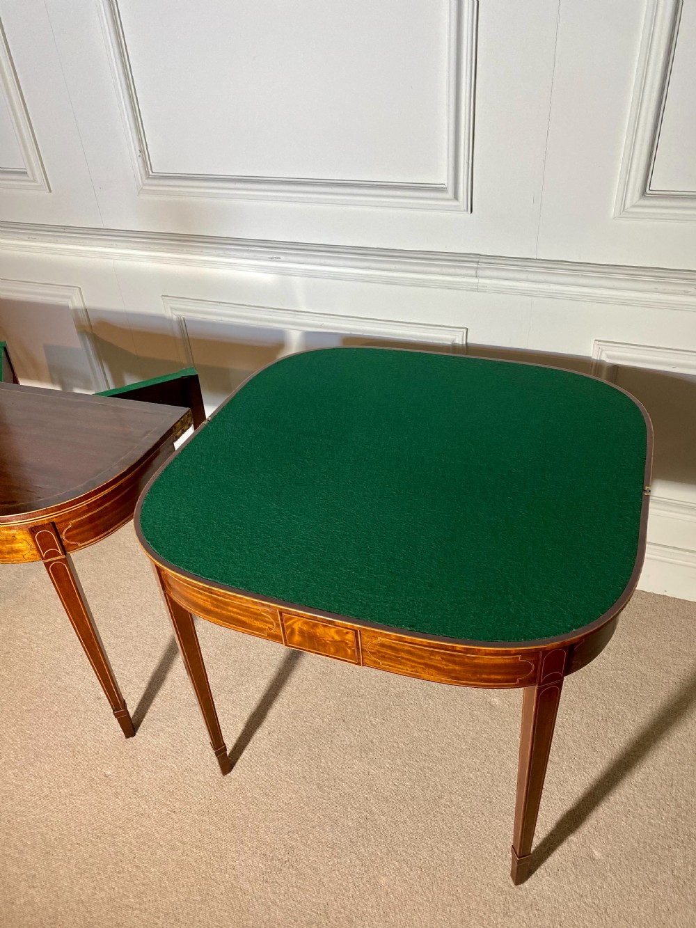 A pair of 18th-century George III mahogany demilune card tables with satinwood crossbanding, boxwood stringing, and square tapered legs. View III