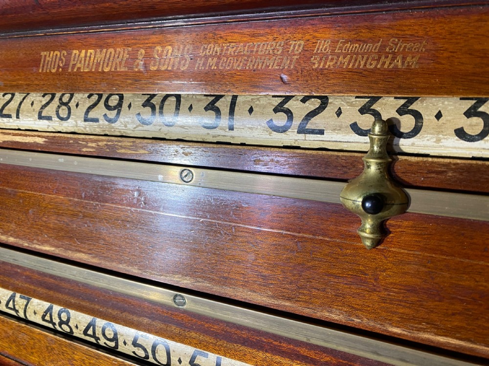 An antique Victorian mahogany and brass snooker scoreboard featuring sliding pointer markers and numbered tracks. View X