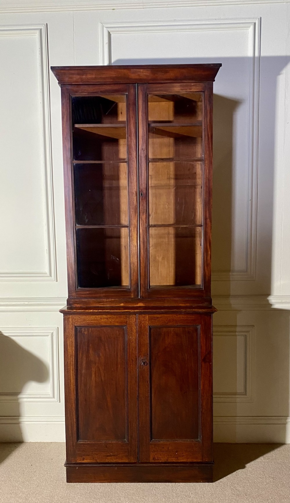 19th Century Tall narrow glazed bookcase