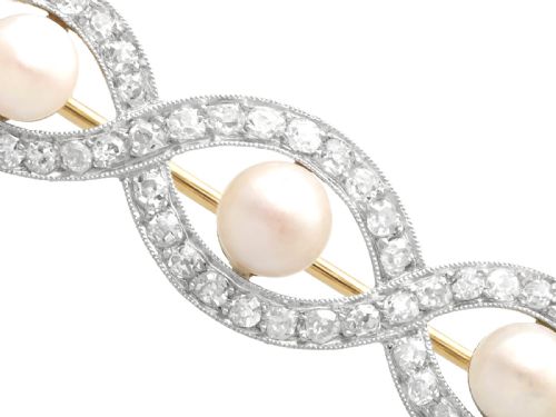 fig 3. An Art Deco gold bar brooch featuring five natural pearls framed within a diamond-set intertwined ribbon setting.