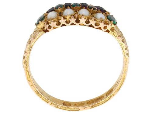fig 4. A Victorian 15ct yellow gold dress ring set with multiple rows of emeralds, amethysts, and pearls featuring carved shoulders.