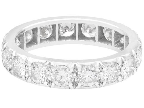 fig 3. A platinum full eternity ring set with a continuous band of round brilliant cut diamonds in claw settings.