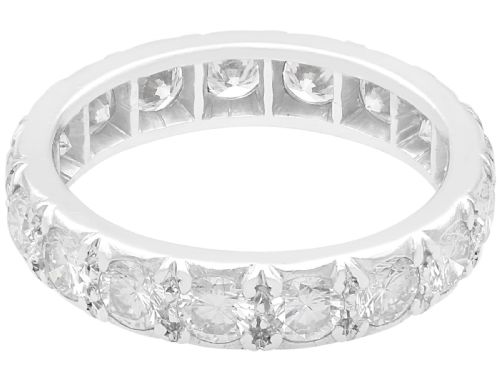 fig 4. A platinum full eternity ring set with a continuous band of round brilliant cut diamonds in claw settings.