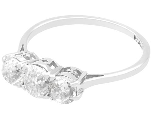 fig 2. An antique 18ct white gold and platinum trilogy ring set with three prominent old cut diamonds in a claw setting.