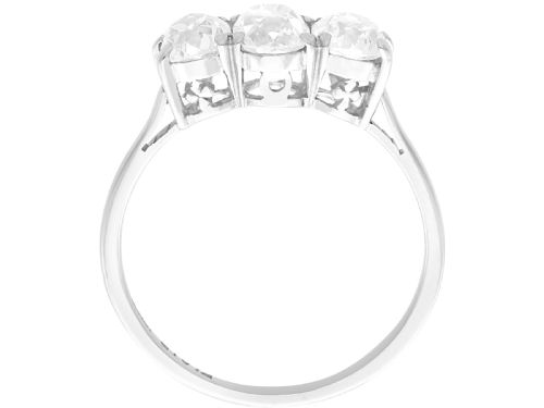 fig 4. An antique 18ct white gold and platinum trilogy ring set with three prominent old cut diamonds in a claw setting.