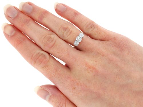 fig 6. An antique 18ct white gold and platinum trilogy ring set with three prominent old cut diamonds in a claw setting.