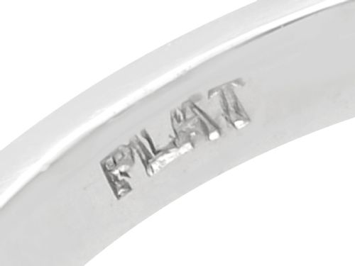 fig 6. A platinum trilogy ring featuring three round brilliant cut diamonds set in individual multi-claw settings along a polished platinum band.