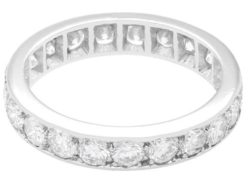 fig 4. An 18ct white gold full eternity ring set with a continuous circle of brilliant-cut diamonds and featuring a pierced inner gallery.