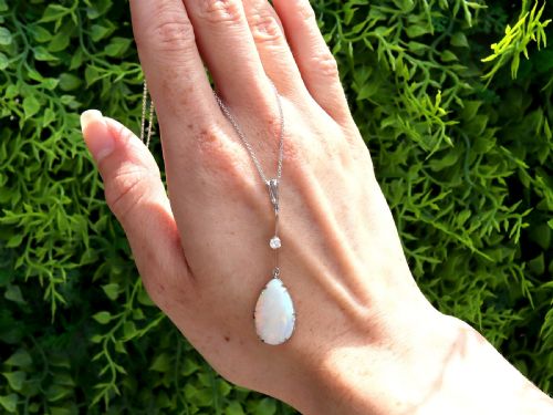ANTIQUE 312CT OPAL AND 010CT DIAMOND 18CT WHITE GOLD PENDANT CIRCA 1930 - ADDITIONAL PHOTO 1