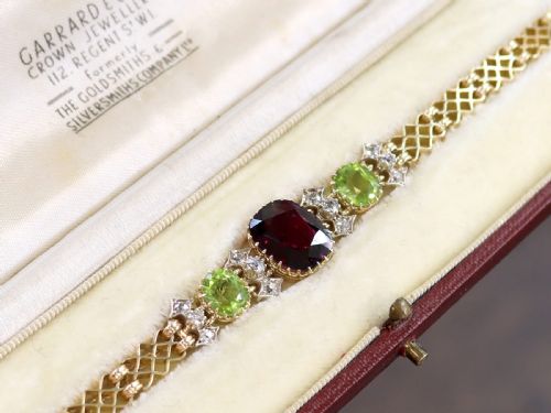 ANTIQUE 517CT GARNET 310CT PERIDOT AND 049CT DIAMOND 15CT YELLOW GOLD BRACELET CIRCA 1910 - ADDITIONAL PHOTO 3