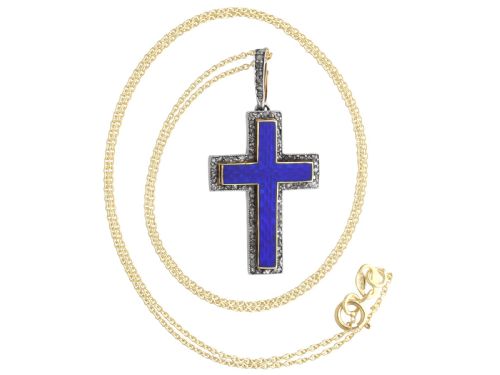 fig 4. An antique Victorian cross pendant featuring cobalt blue enamel framed by small diamonds set in metal atop a 15ct yellow gold backing.
