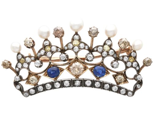 ANTIQUE 145CT SAPPHIRE 616CT DIAMOND AND NATURAL PEARL 9CT YELLOW GOLD CROWN BROOCH CIRCA 1880