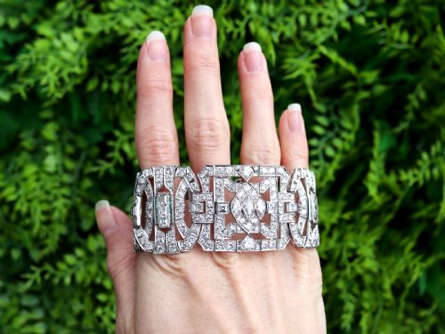 ANTIQUE ART DECO 3325CT DIAMOND AND 030CT EMERALD PLATINUM BRACELET CIRCA 1930 - ADDITIONAL PHOTO 1
