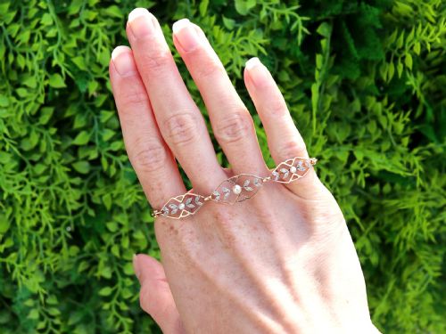 ANTIQUE SEED PEARL AND 012CT DIAMOND 15CT ROSE GOLD BRACELET CIRCA 1930 - ADDITIONAL PHOTO 1