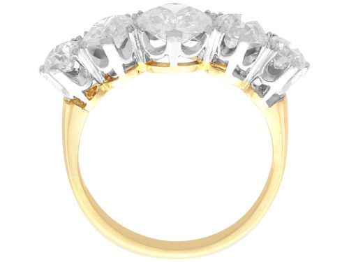 fig 6. An 18ct yellow gold five stone ring set with five graduated round diamonds in claw settings.